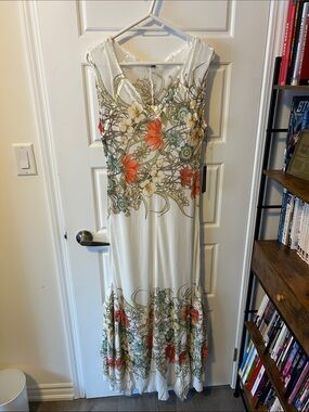 Komarov White V-Neck Maxi Dress with Whimsical Floral Accents